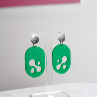 Matte Green Acrylic Earrings on display stand