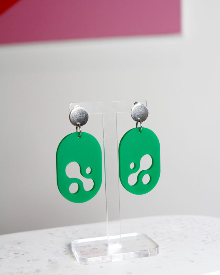 Matte Green Acrylic Earrings on display stand