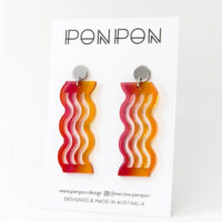 Pon Pon "Waves' acrylic earrings in warm gradient colour