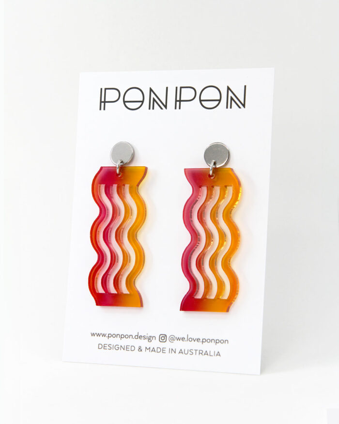 Pon Pon "Waves' acrylic earrings in warm gradient colour