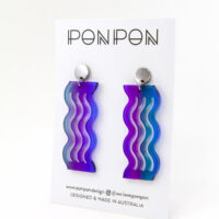 Pon Pon Acrylic Earrings in Sunset Gradient.